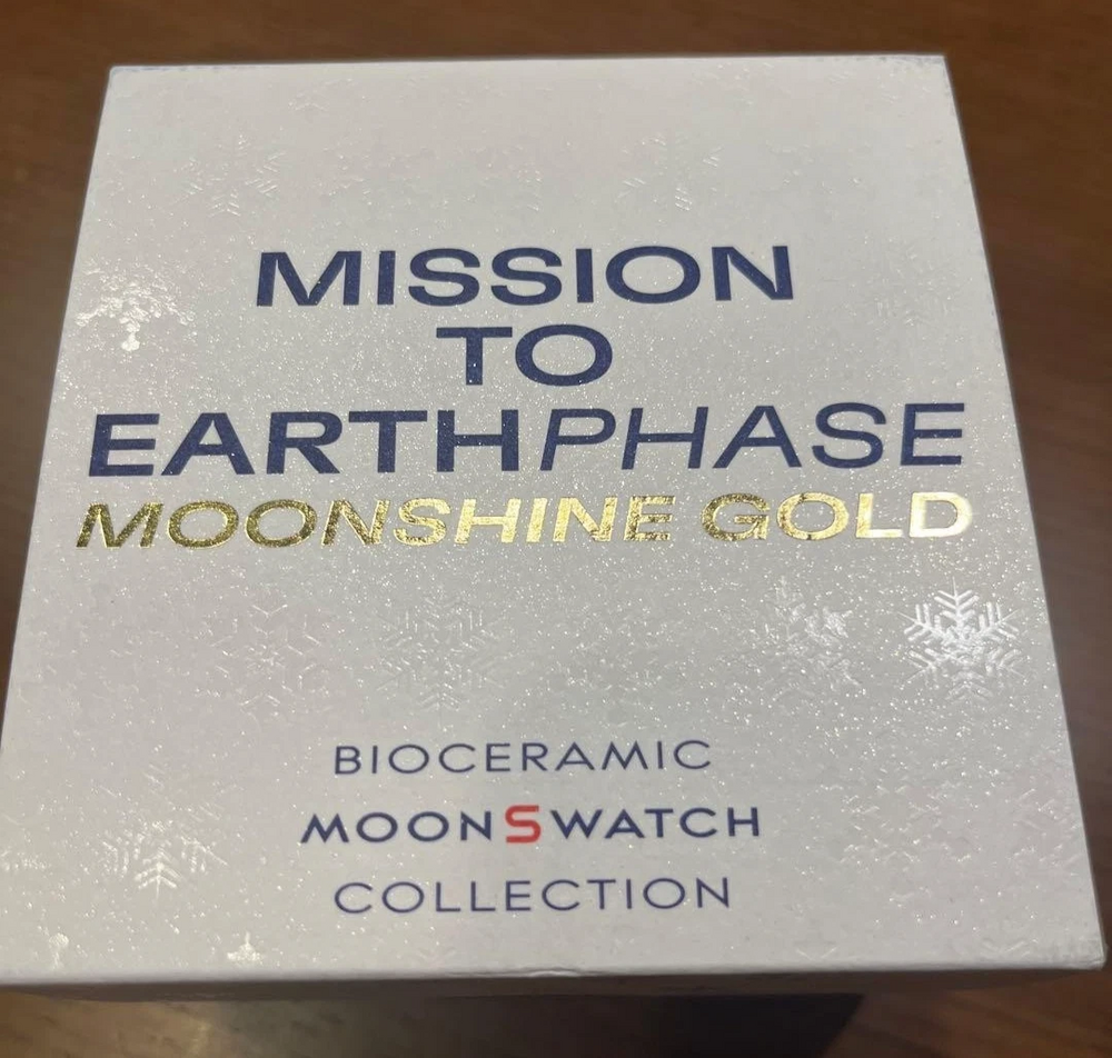 Swatch x Omega MISSION TO EARTHPHASE MOONSHINE GOLD Snoopy Moon MSO33W701L - Picture 6 of 7